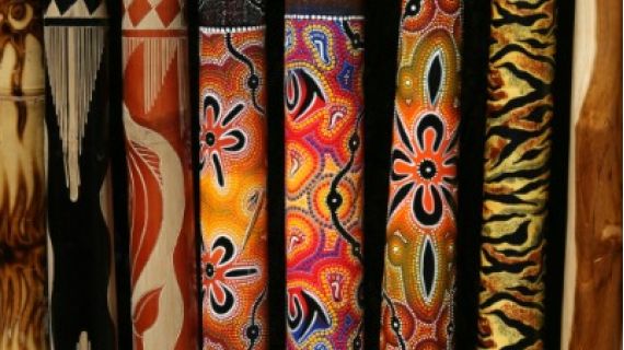 series of brightly coloured Aboriginal dot painting designs