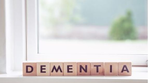 Wooden blocks with of the word Dementia.