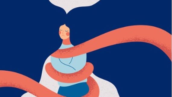 woman with purple hair bound by an orange rope.