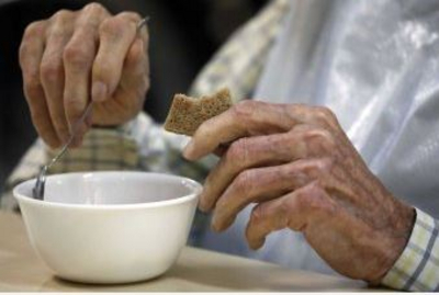 Hands with a bowl of food